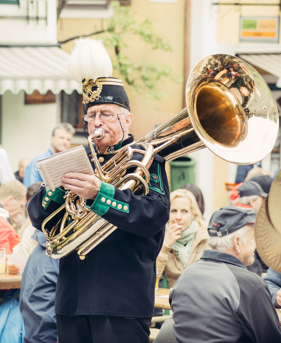 HALLSTATT, AUSTRIA - MAY 03, 2014: Musician from the local orchestra during the street festival on the main square in Hallstatt village, Austria (UNESCO World Heritage region)