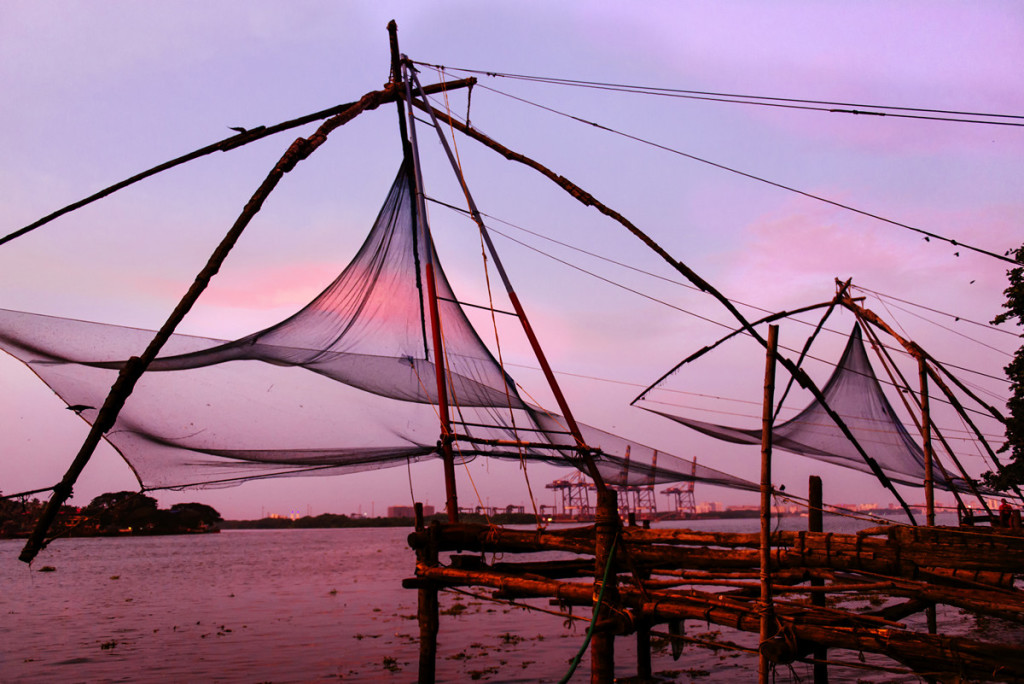 Chinese fishing nets on sunset background in Cochin (Kochi), Kerala, India